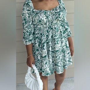 Green floral dress.